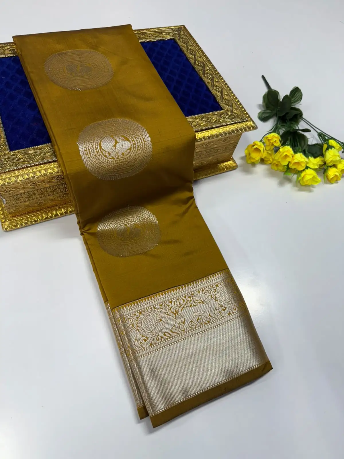 Peacock Floral Round Motif Zari Butta Elephant Brocade Border Semi Kanchipuram Silk Saree